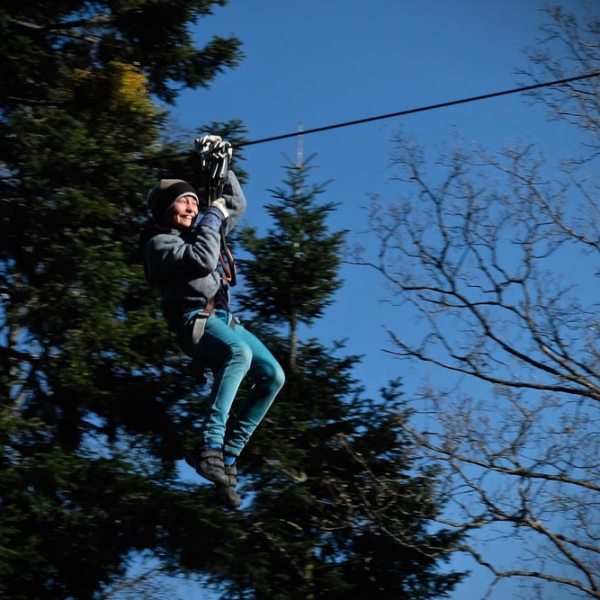 a man flying through the air while riding a skateboard