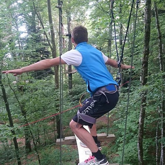 a young man jumping in the air