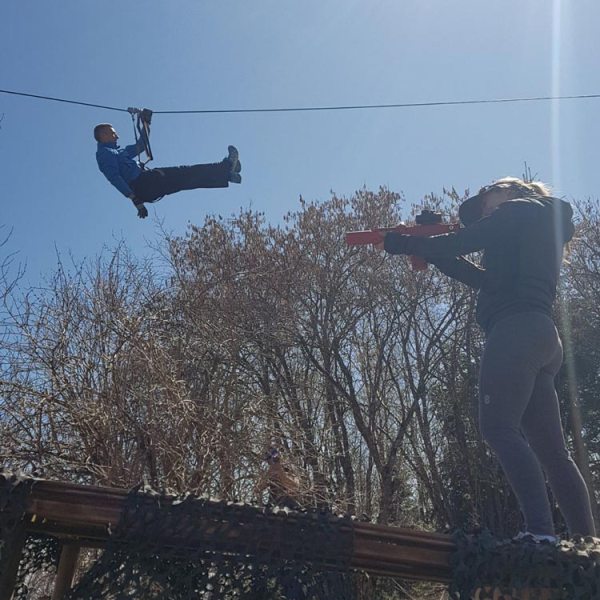 a group of people jumping in the air
