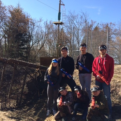 a group of people posing for the camera