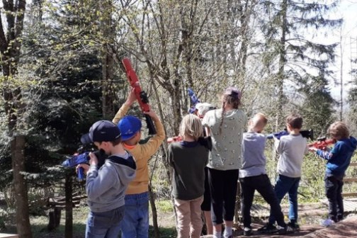 a group of people in a forest