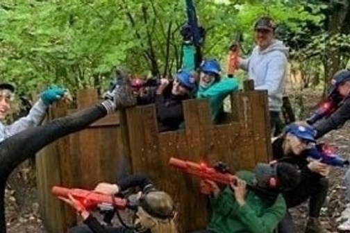 a group of people jumping in the air