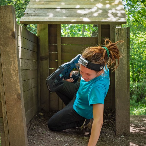a young boy sitting on a bench
